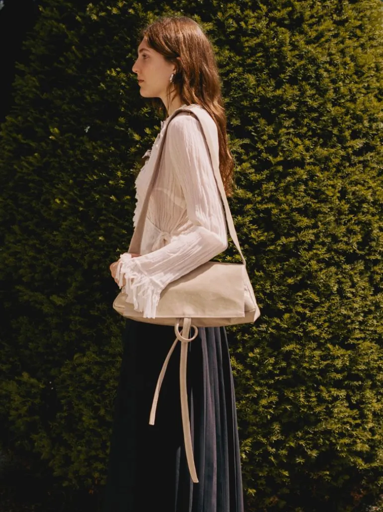 Triangle Messenger Bag crushed patent sand