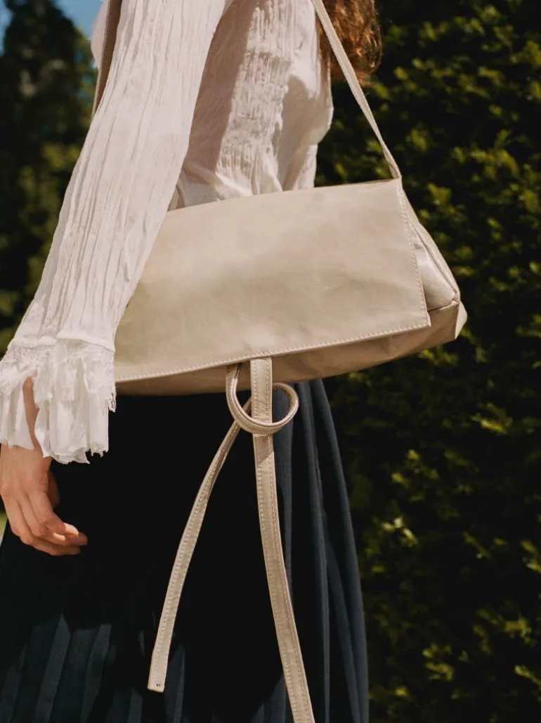 Triangle Messenger Bag crushed patent sand